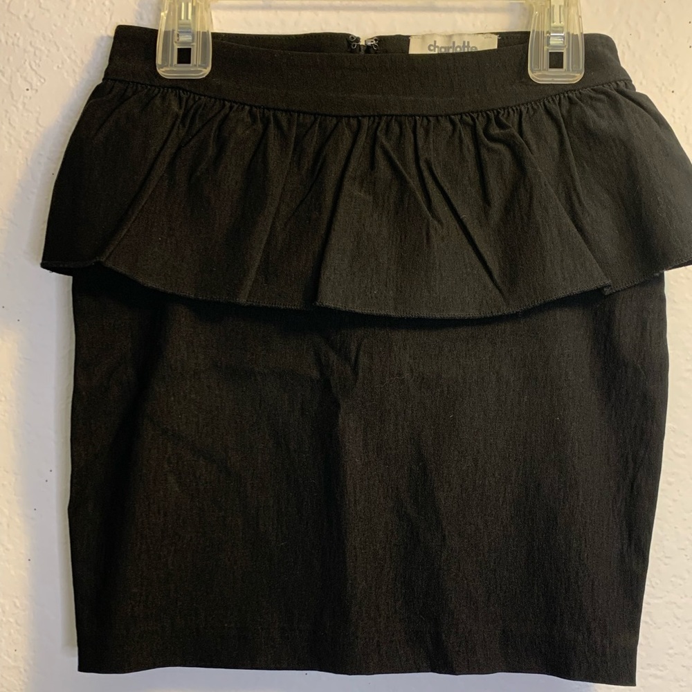 Black mini peplum skirt